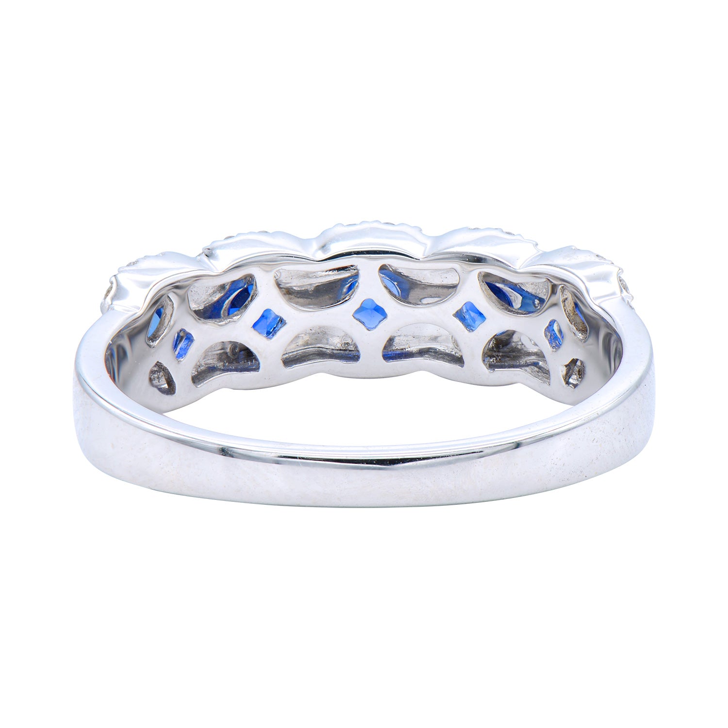18K white gold ring with blue sapphires and diamonds.