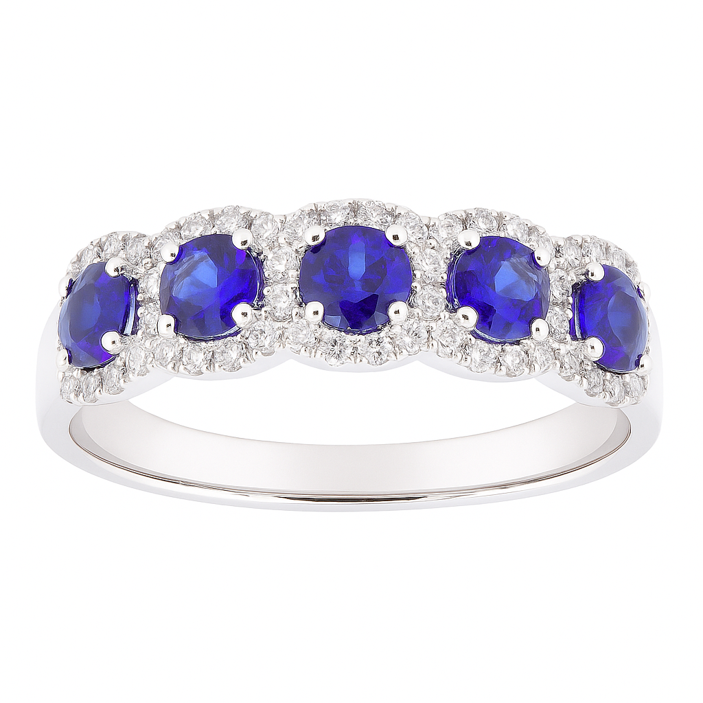 18K white gold ring with five blue sapphires surrounded by diamonds.